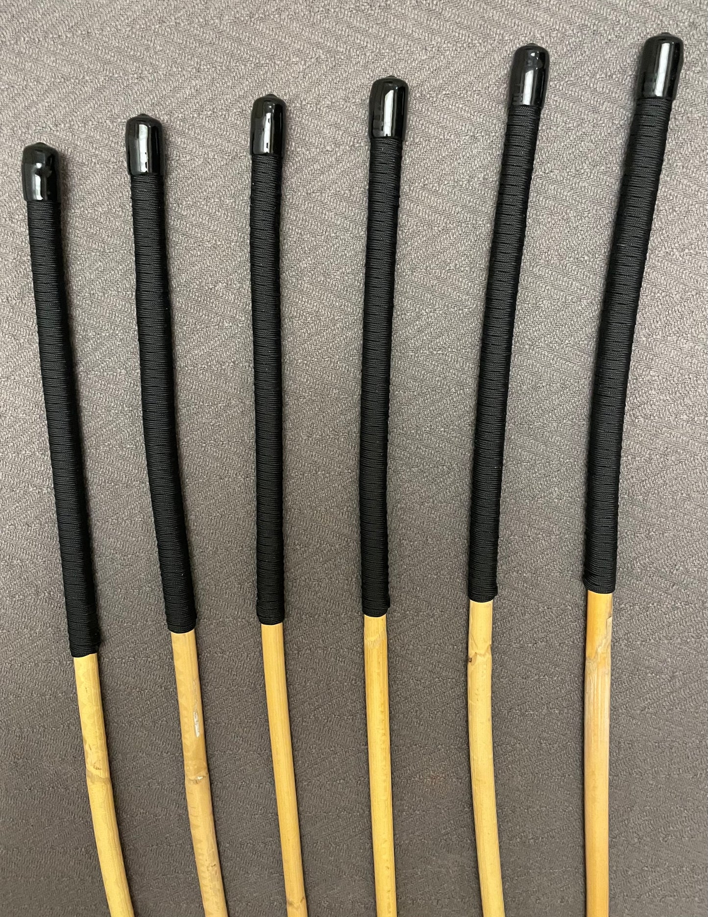 Set of 6 Classic Kooboo Rattan OTK Punishment canes with RED Paracord Handles - Over the Knee OTK Cane Set