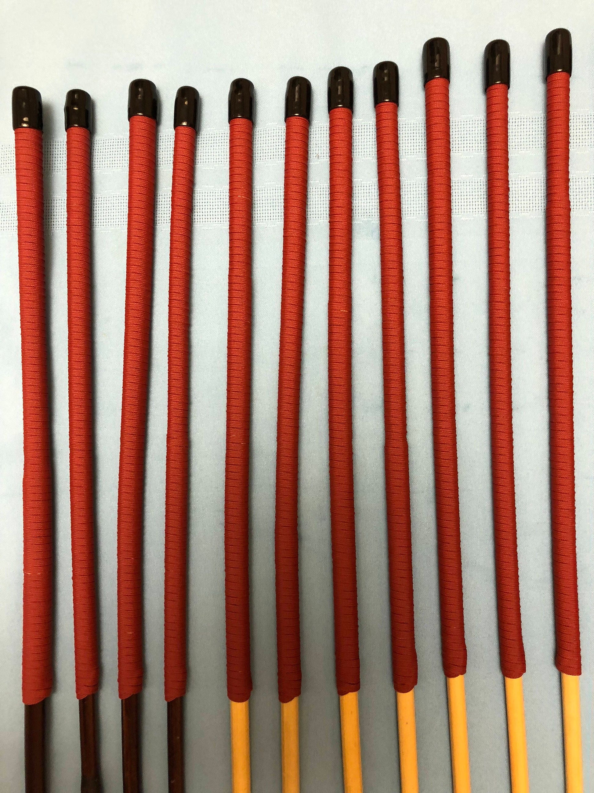 Set of 12 Whippy Smoked Dragon Canes / Classic Dragon Canes / Thin Stingy Canes / Falaka Canes -  Red Paracord Handles