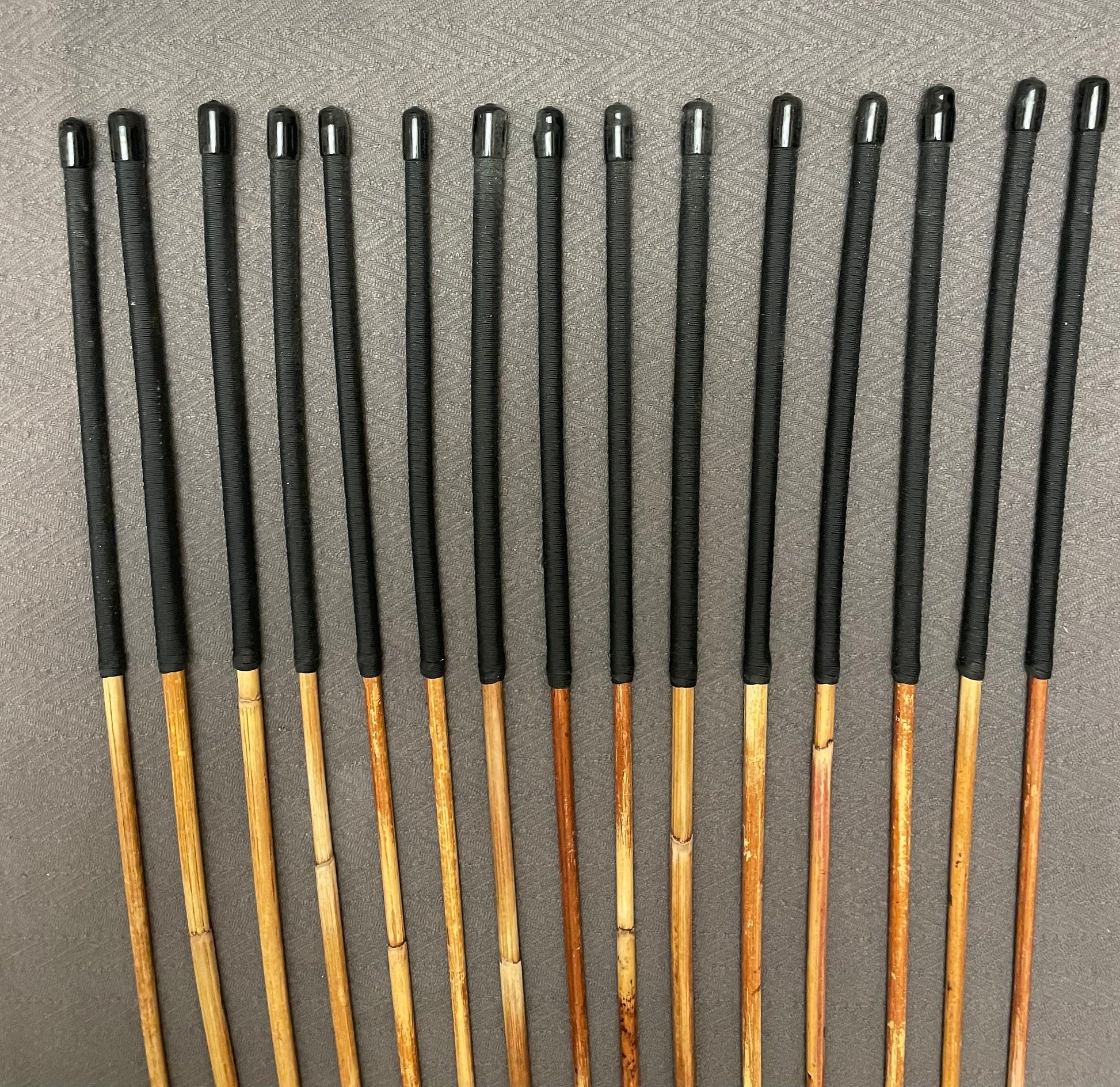Set of 15 Classic Dragon Rattan Punishment Canes with Black Paracord Handles - 95 to 100 cms Length - Sales Special
